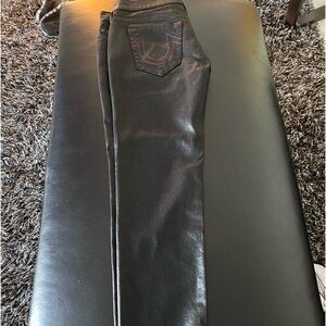 Coated jeans looks like leather